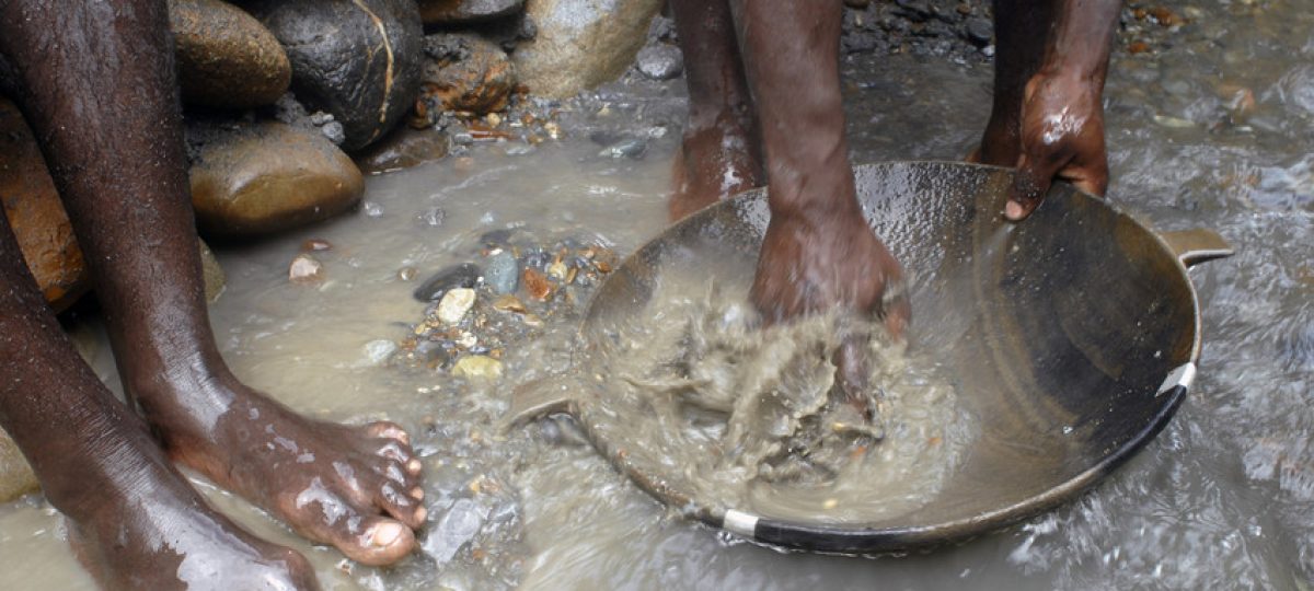 Panning for gold at Americo's mine in Angostura, Choco